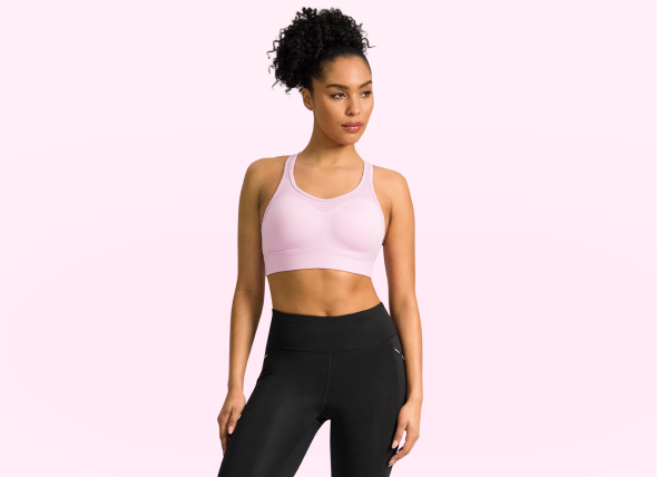 female model in pink sports bra