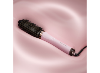 Picture of a pink hair dryer brush