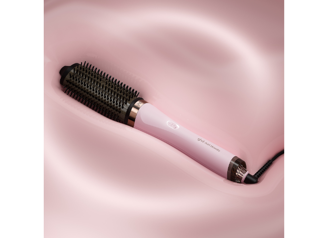 Picture of a pink hair dryer brush