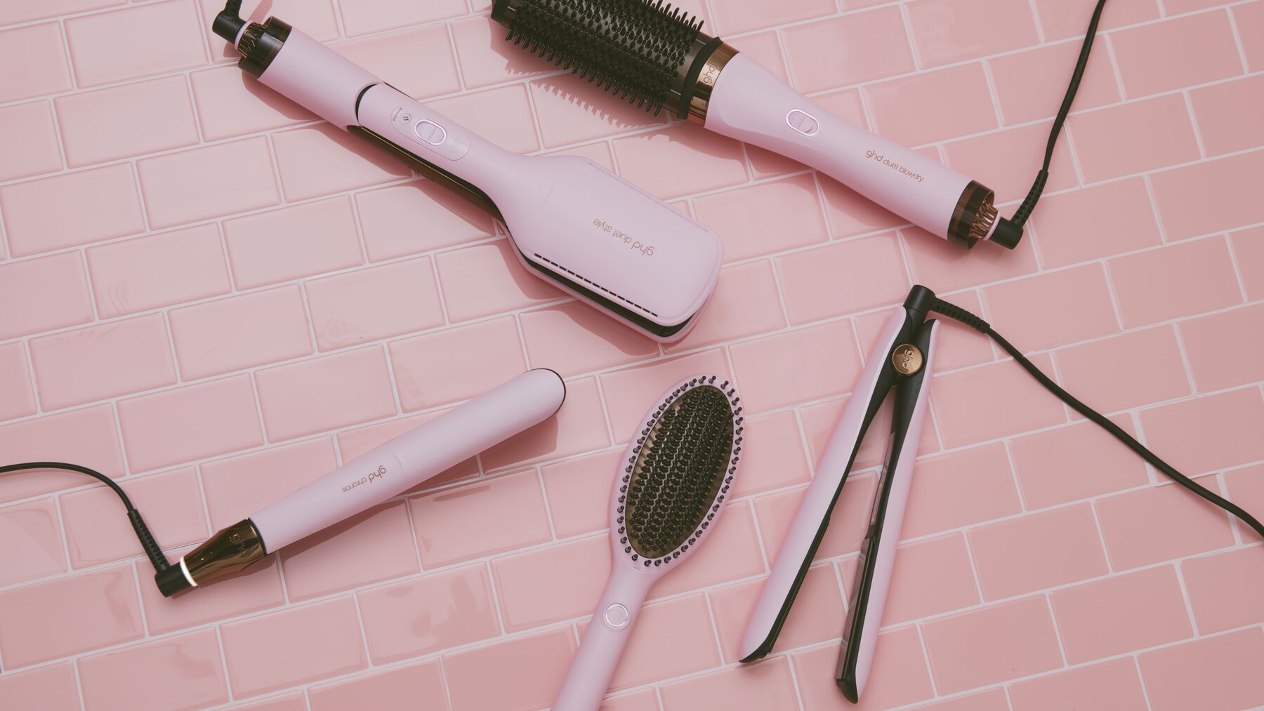 picture of five pink hair styler tools