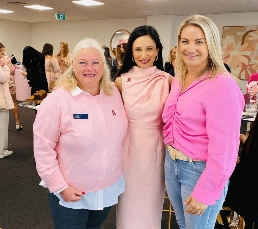 three women dressed in pink
