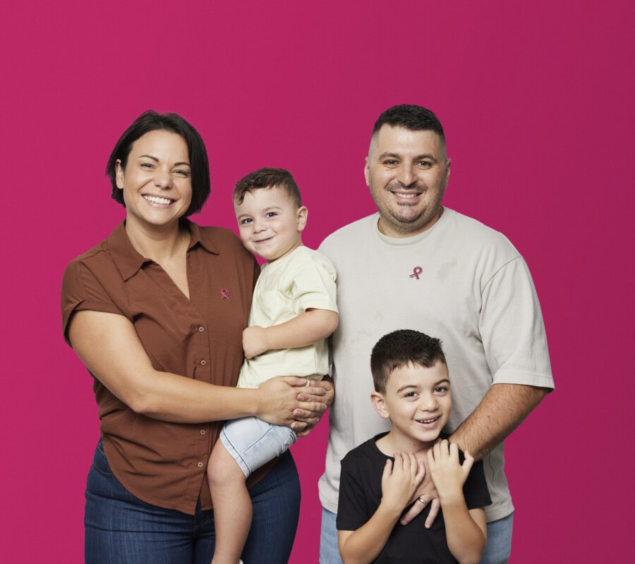 Picture of a family of four, a husband and wife with their two boys