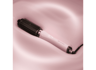 Picture of a pink hair dryer brush