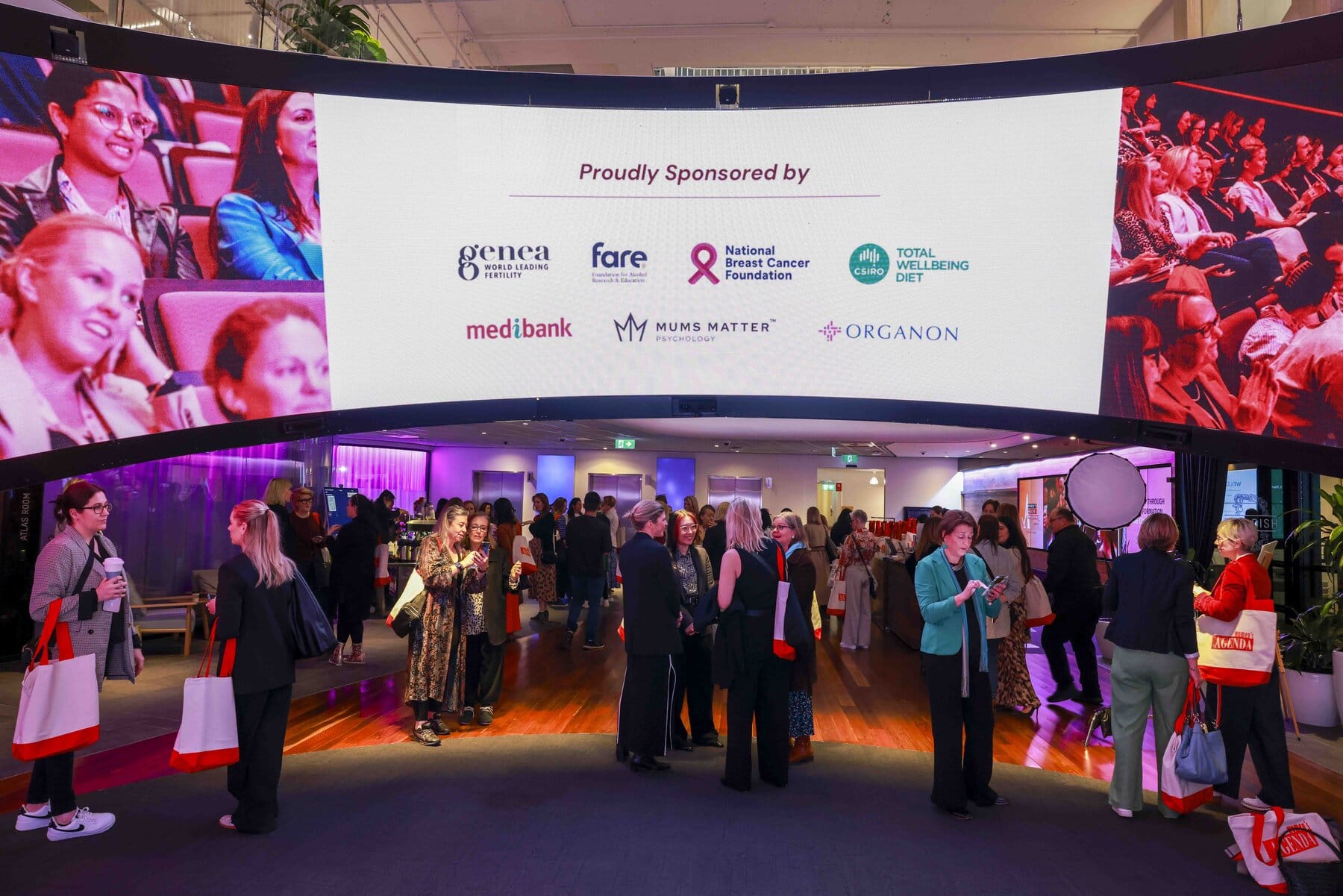 Attendees of the Women's Agenda 2025 Health and Wellbeing Summit mingling.