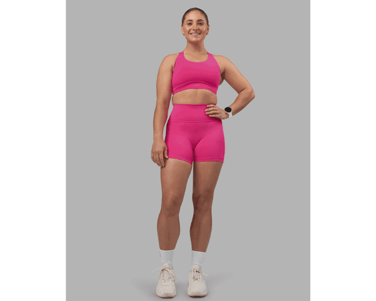 Image of a woman in pink activewear