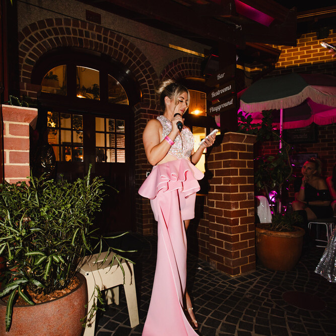 Image of a lady in a pink dress