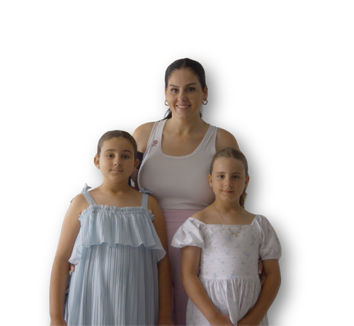 A photo of a mother and her two daughters
