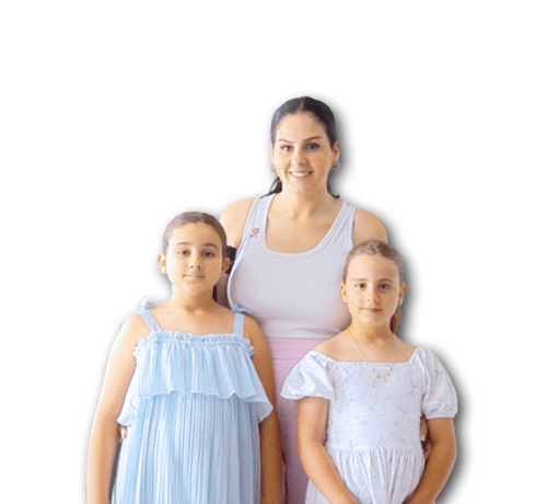 A photo of a mother and her two daughters