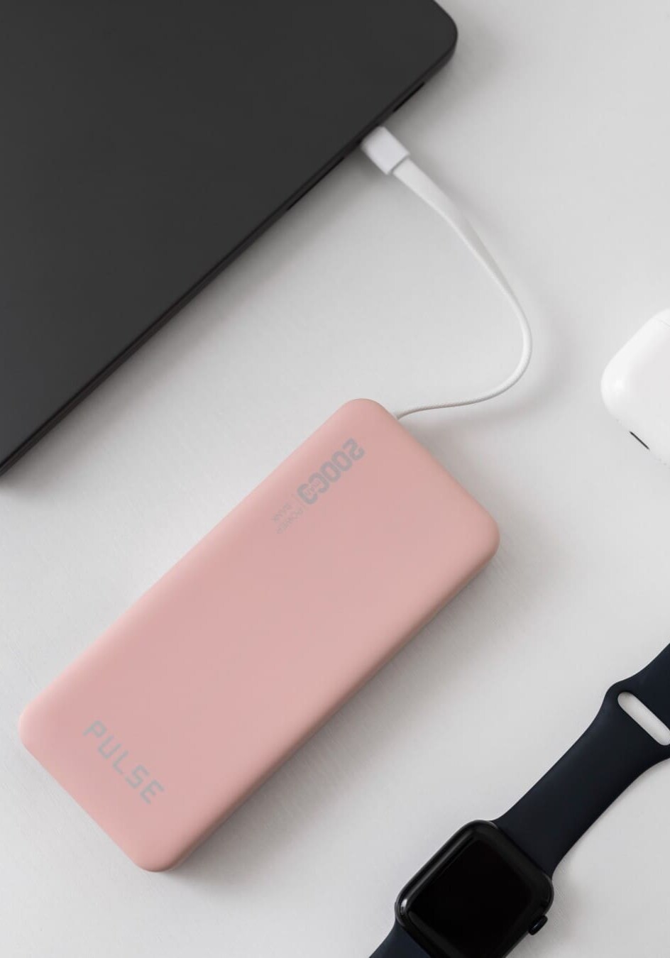 Image of a pink portable charger